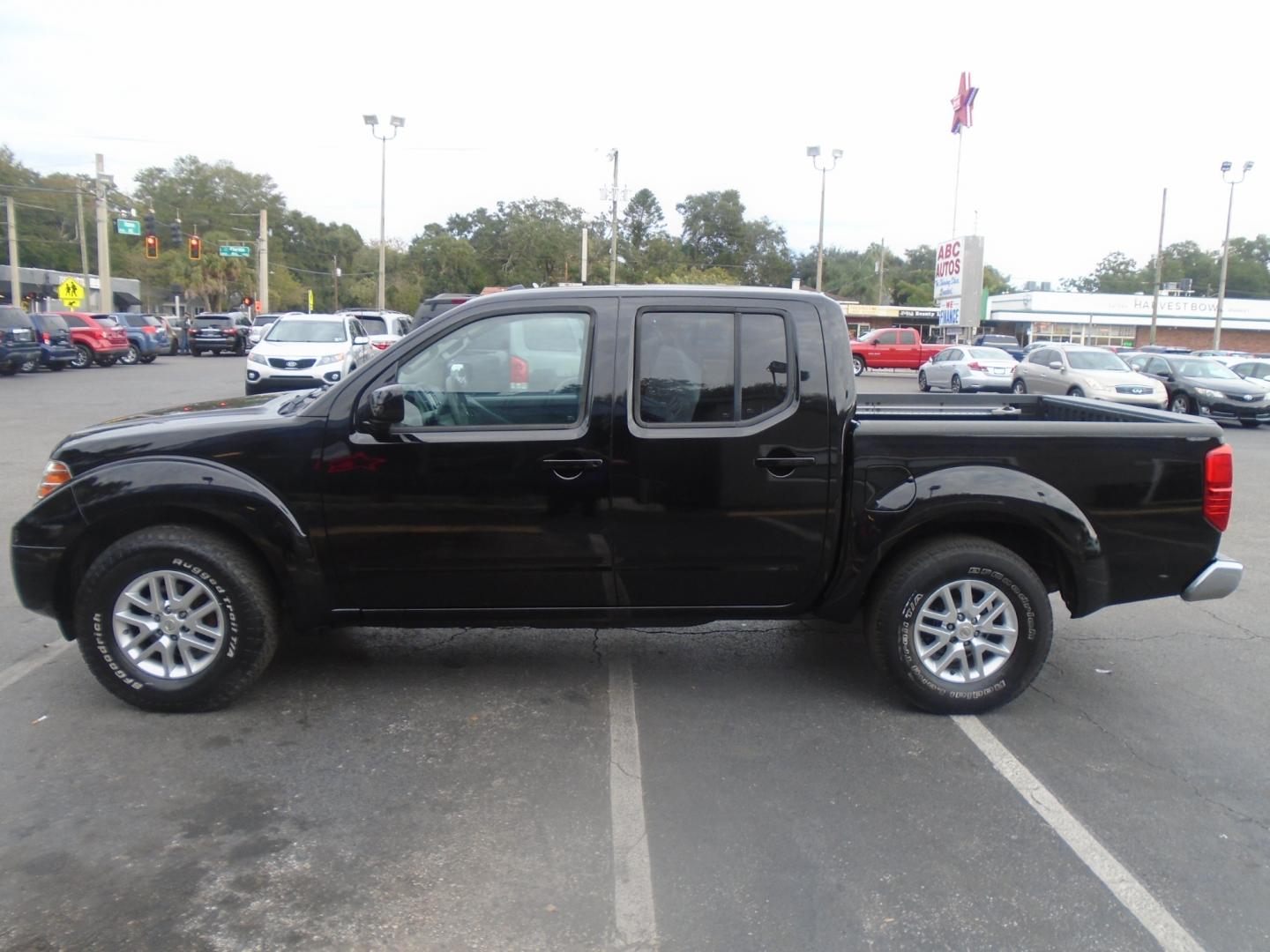 2014 Nissan Frontier S Crew Cab 5AT 2WD (1N6AD0ER3EN) with an 4.0L V6 DOHC 24V engine, 5-Speed Automatic transmission, located at 6112 N Florida Avenue, Tampa, FL, 33604, (888) 521-5131, 27.954929, -82.459534 - Photo#0